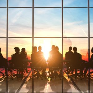 tax-exempt business association -management team in office silhouette